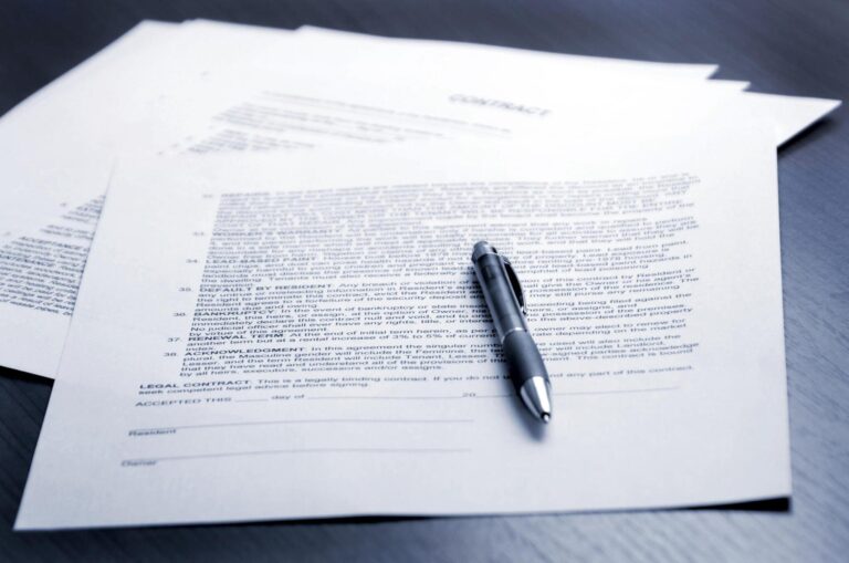 documents of prenuptial agreements in Kenya with a pen on a desk